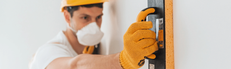 handyman-in-yellow-uniform-and-protective-mask-pol-2023-11-27-04-57-52-utc@2x